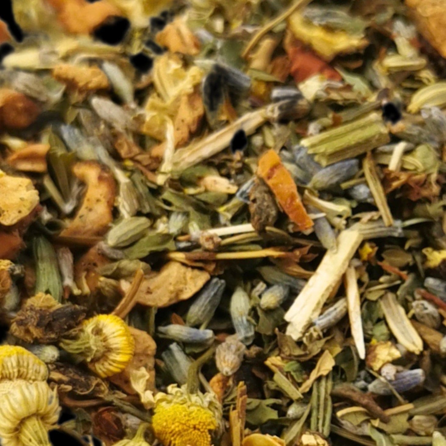 Sweet Dreams herbal tea blend by Porter Hill Tea Company with dried fruit and herbs in a cozy cup.