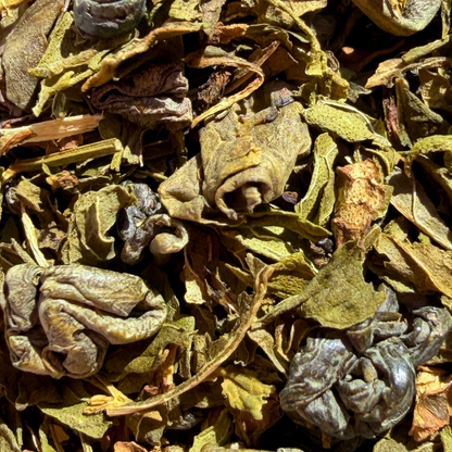 Loose leaf green tea called Mint Bazaar by Porter Hill Tea Company, featuring fresh mint leaves and vibrant green tea leaves.
