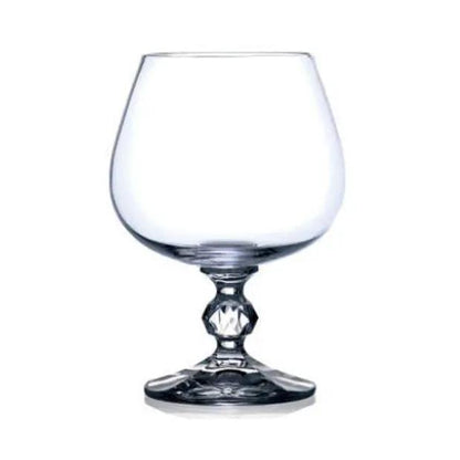 Set of six Claudia Crystalite whisky tumblers from Glassware UK, 250ml crystal brandy glasses on a wooden surface.