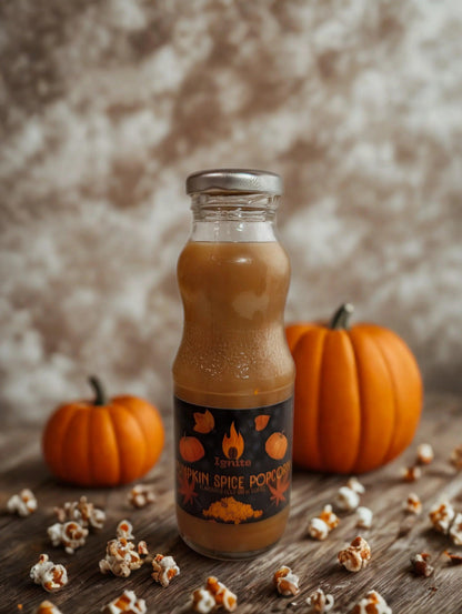 Warm-colored cold brew pack with popcorn and pumpkin spice flavor from Ignite Coffee Co, perfect for cozy moments.