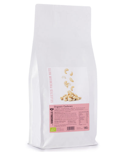 Raw organic cashew nuts from RAWGORILLA, 1kg, displayed in a natural pile, showcasing smooth, light-colored kernels on a clean background.