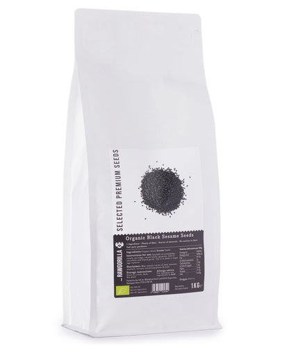 Organic Black Sesame Seeds from RAWGORILLA, 1kg pack, close-up of small black seeds in a clear container on a white background.