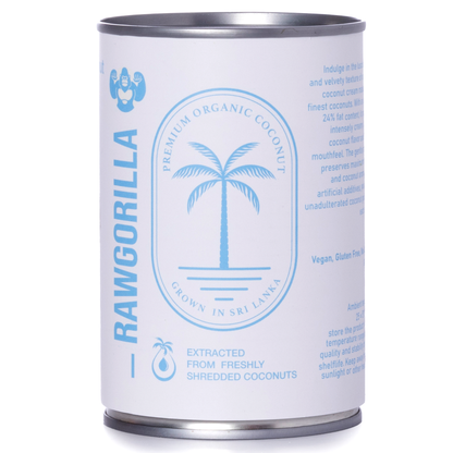 Cream in a jar labeled RAWGORILLA Organic Coconut Cream, 400ml, by Whole Food Earth, showing the product's packaging.
