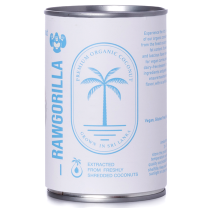 Canned organic coconut milk from Whole Food Earth by RAWGORILLA, 400ml container showing coconut milk inside