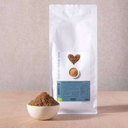 Organic Milled Flaxseeds from RAWGORILLA, 1kg pack, showing golden ground flaxseeds in a clear container, part of Whole Food Earth nuts and seeds.