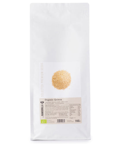 Raw organic quinoa grains in a clear bowl, from RAWGORILLA by Whole Food Earth, 1kg package, suitable for healthy cooking and salads.