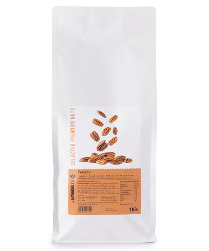 Raw Gorilla pecans in a 1kg bag from Whole Food Earth, close-up of shelled pecans with textured shells and natural nut interior.