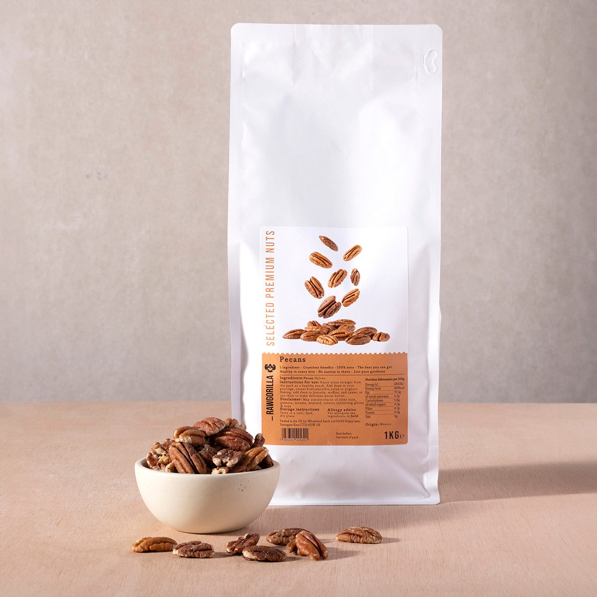 Raw pecans from Whole Food Earth, 1kg package, natural nuts and seeds by RAWGORILLA, shown in a close-up image.