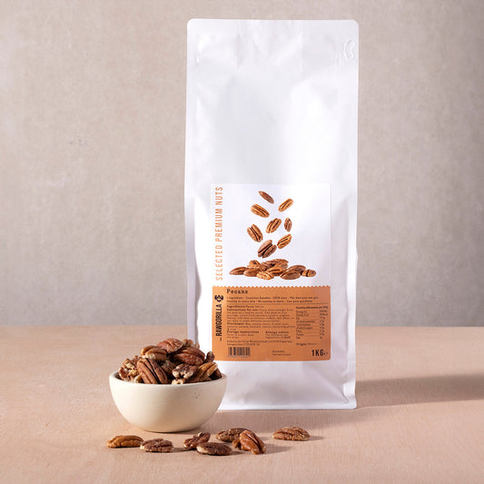 Raw pecans from Whole Food Earth, 1kg package, natural nuts and seeds by RAWGORILLA, shown in a close-up image.
