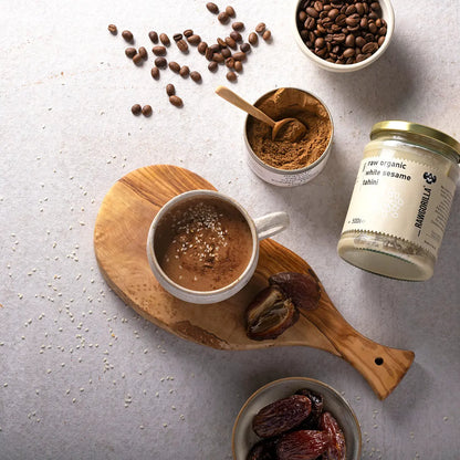 Creamy white sesame tahini dip from RAWGORILLA by Whole Food Earth, showcasing a jar of smooth, organic sesame spread.
