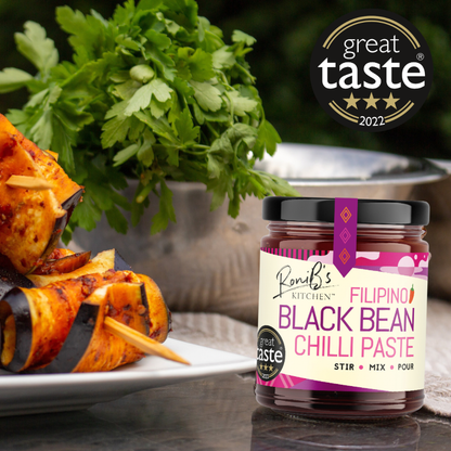 RoniBs Kitchen Filipino black bean chili paste hot sauce in jar, featuring dark chili and bean ingredients, awarded for great taste.