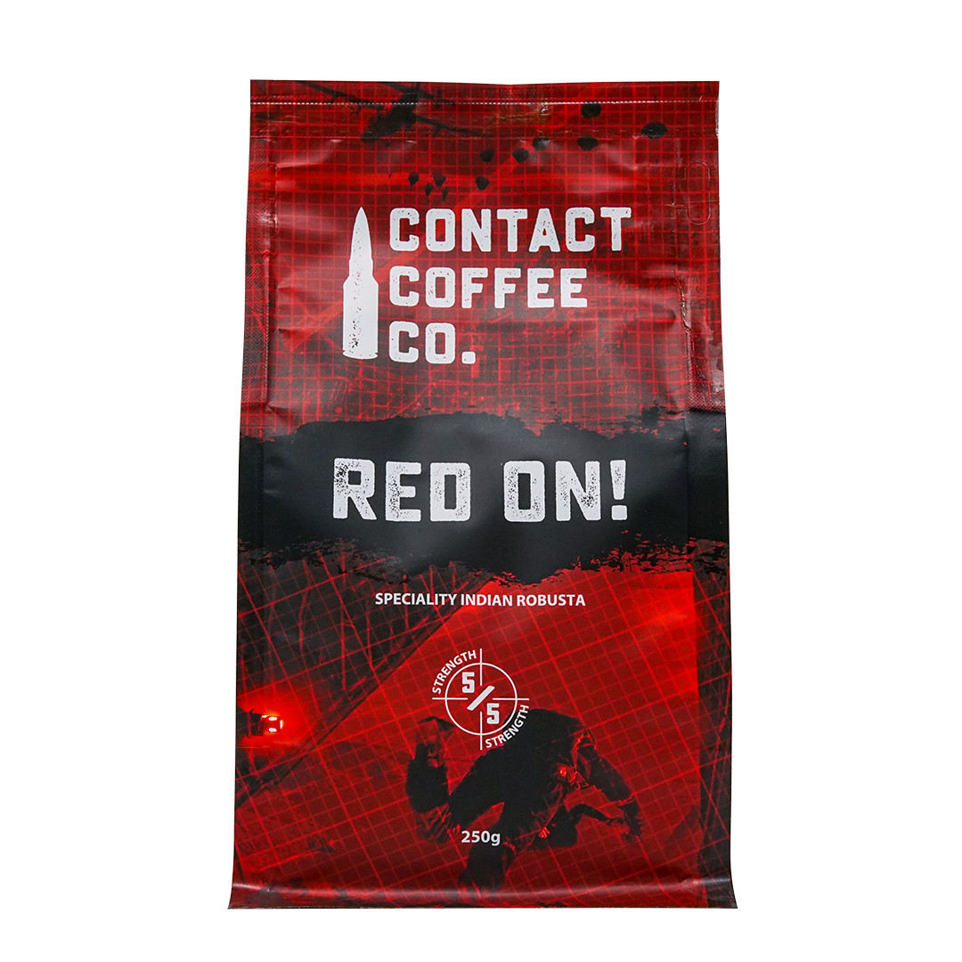 Red On! high-caffeine coffee from Contact Coffee Company Ltd., showcasing a brewed coffee cup with rich, dark liquid and a coffee bean.