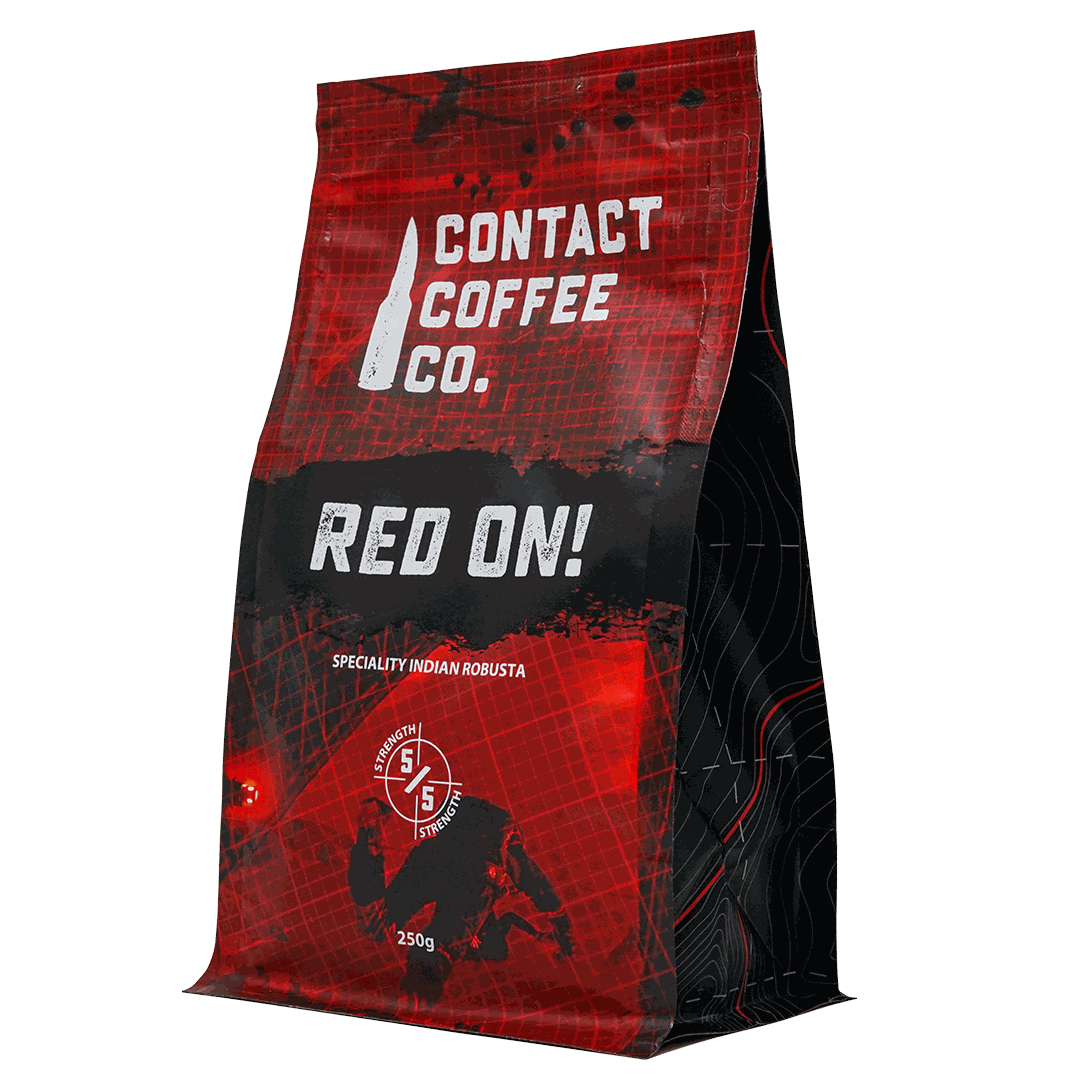 Red On! high-caffeine coffee by Contact Coffee Company Ltd. in a sleek red coffee bag with bold branding.