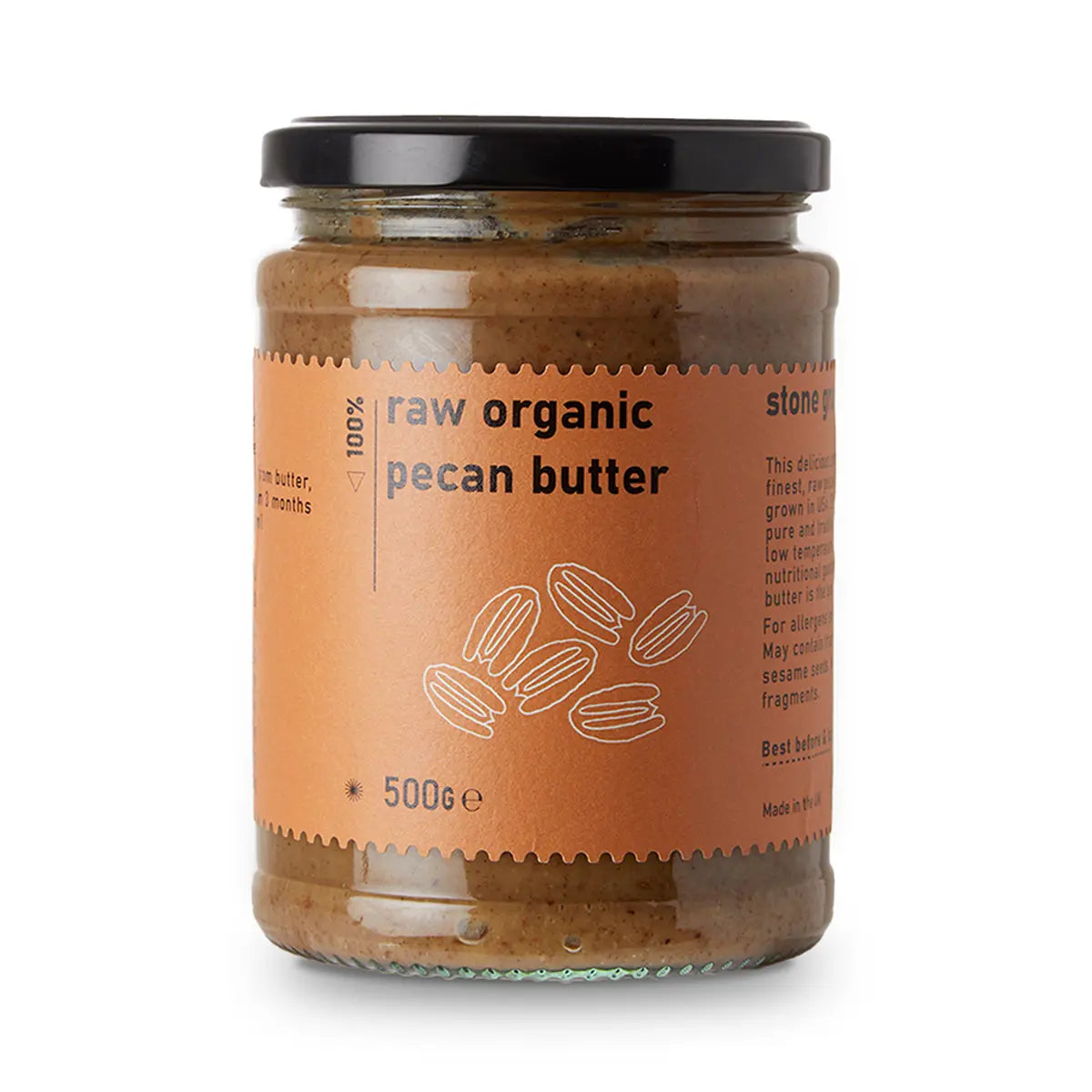 Creamy raw organic pecan butter from RawGorilla, displayed in a glass jar with a spoon, highlighting its rich, nutty texture.