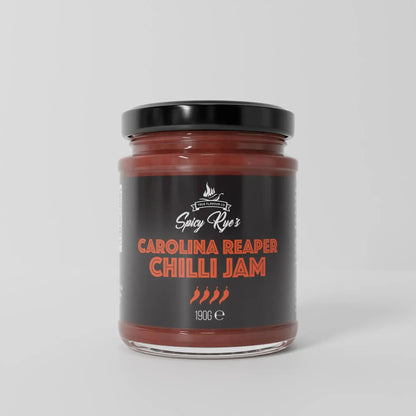 Spicy Ryes Carolina Reaper Chilli Jam jar with vibrant label, showcasing bright red chili jam and spicy flavor profile.