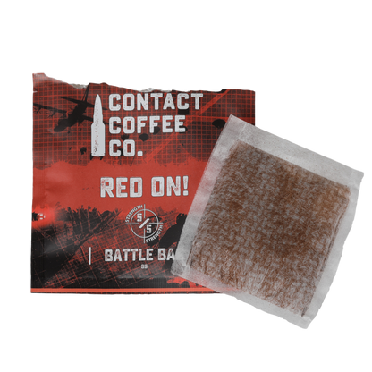 Red single-serve coffee brew bag from Contact Coffee Company Ltd., ready for brewing with vibrant red packaging.
