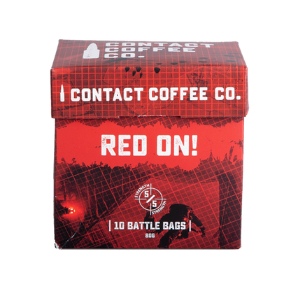 Single serve coffee bag in bright red packaging from Contact Coffee Company Ltd., designed for quick brewing.