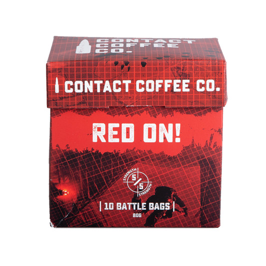 Single serve coffee bag in bright red packaging from Contact Coffee Company Ltd., designed for quick brewing.