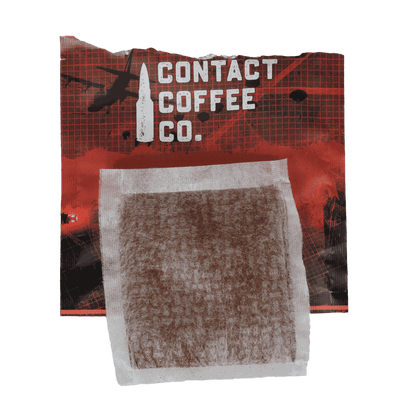 Red single serve coffee bag from Contact Coffee Company Ltd., showcasing vibrant red packaging for easy brewing.