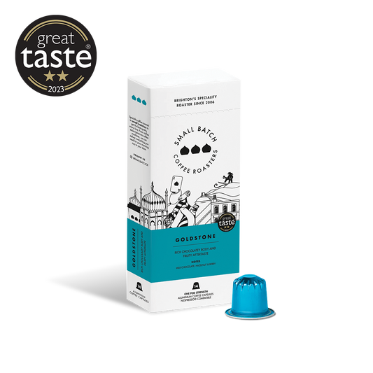 Small Batch Coffee Goldstone coffee pods in their packaging, ready for brewing with a sleek, modern design.