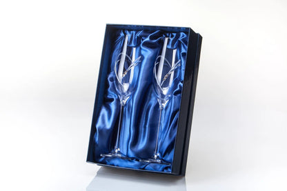 Glassware UK diamanté champagne flutes with heart-shaped cutting, displayed in a gift box, elegant and sparkling for celebrations.