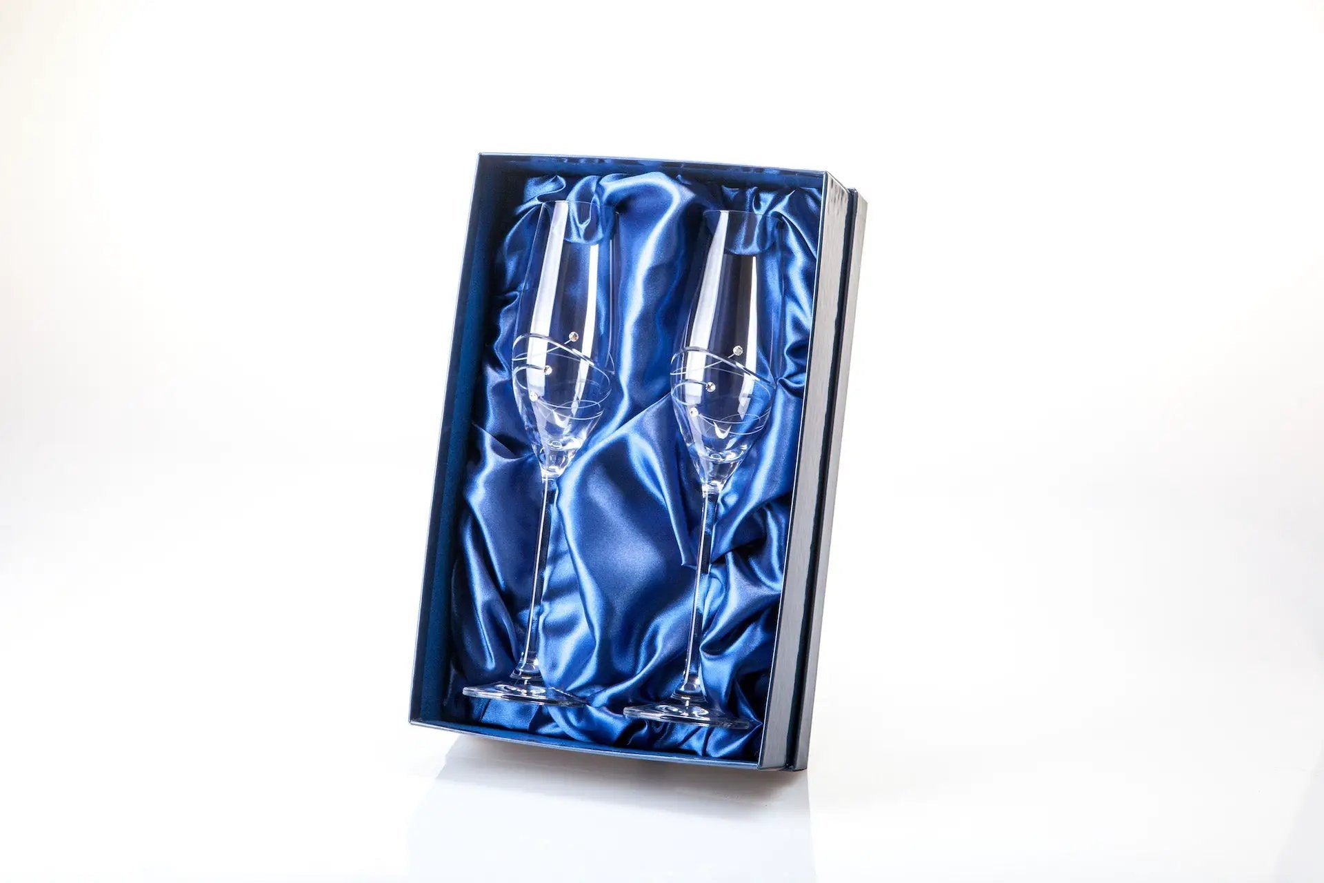 Elegant Glassware UK champagne flutes with spiral design and diamante accents in a gift box, perfect for special occasions.
