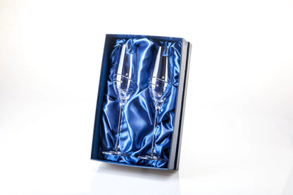 Elegant Glassware UK champagne flutes with spiral design and diamante accents in a gift box, perfect for special occasions.