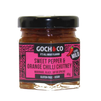 Sweet pepper and orange chili chutney by Goch & Co, showing a jar of vibrant, chunky chutney with peppers and chili pieces inside.