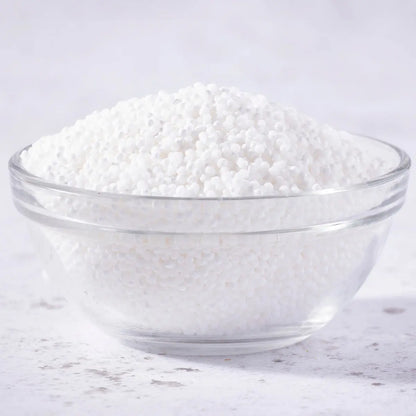 Whole Food Earth sago pearls, small translucent grains used as a gluten-free flour and cooking ingredient in various dishes.