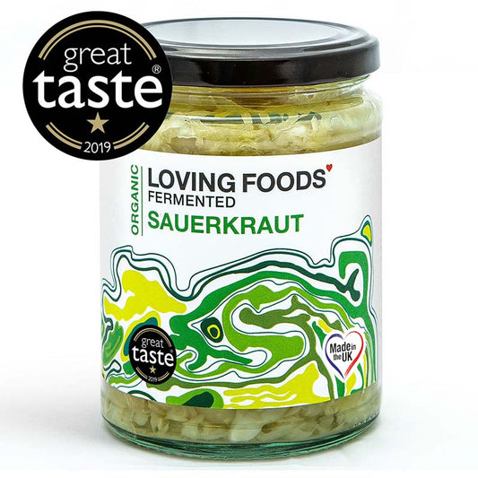 Organic Loving Foods sauerkraut in a glass jar, showcasing its tangy fermented cabbage, ready for healthy meals.