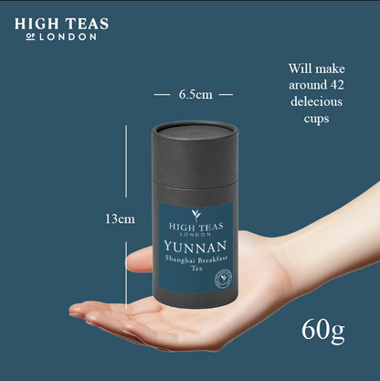 High Teas Yunnan Imperial Gold Tip loose leaf Shanghai Breakfast Tea in a clear glass jar, showcasing golden tips and dark leaves.