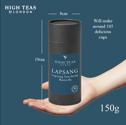 Loose leaf Lapsang Souchong Butterfly tea by High Teas, showing dark, twisted tea leaves in a clear container.