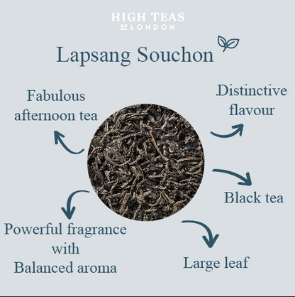 Loose leaf Lapsang Souchong Butterfly tea from High Teas, showcasing dark, twisted tea leaves in a clear container.