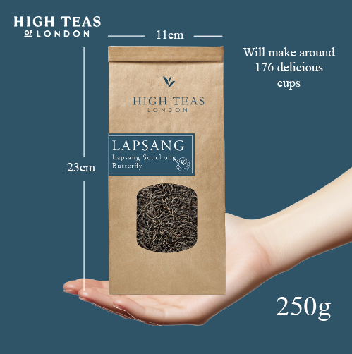 Loose leaf Lapsang Souchong Butterfly tea from High Teas, showing dark, twisted tea leaves in a clear glass jar.