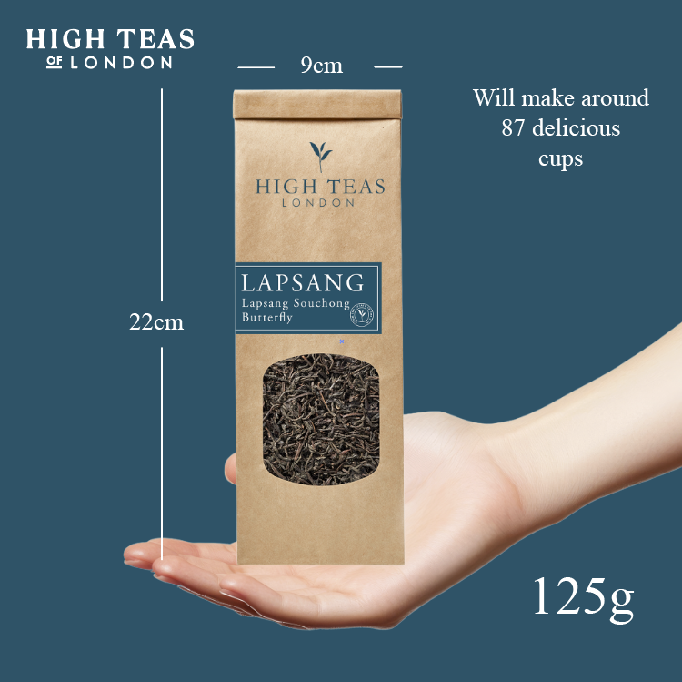 Loose leaf Lapsang Souchong Butterfly tea by High Teas, showing dark, twisted tea leaves in a clear glass jar.