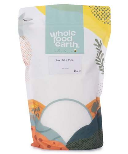 Fine sea salt from Whole Food Earth, 2kg mineral salt with crystalline texture and natural white color.