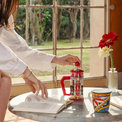 Bialetti X Dolce&Gabbana Sicilian Cart coffee press, 3-cup cafetière by Brew Italia with vibrant Sicilian design, ceramic and metal materials.