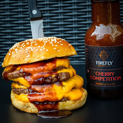 FireFly Barbecue Competition Cherry BBQ Sauce bottle with label, showcasing rich, dark cherry-flavored barbecue sauce.