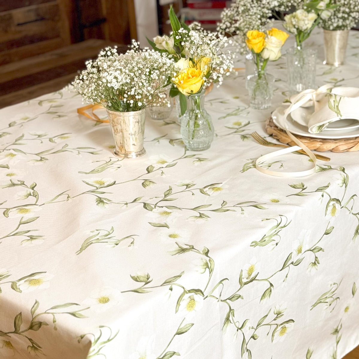 Snowdrop and hellebore floral tablecloth from Avalon Home UK featuring delicate spring flower patterns on fabric.