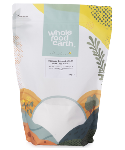 Two kilograms of Whole Food Earth Sodium Bicarbonate baking soda, a mineral and salt product in a clear plastic bag