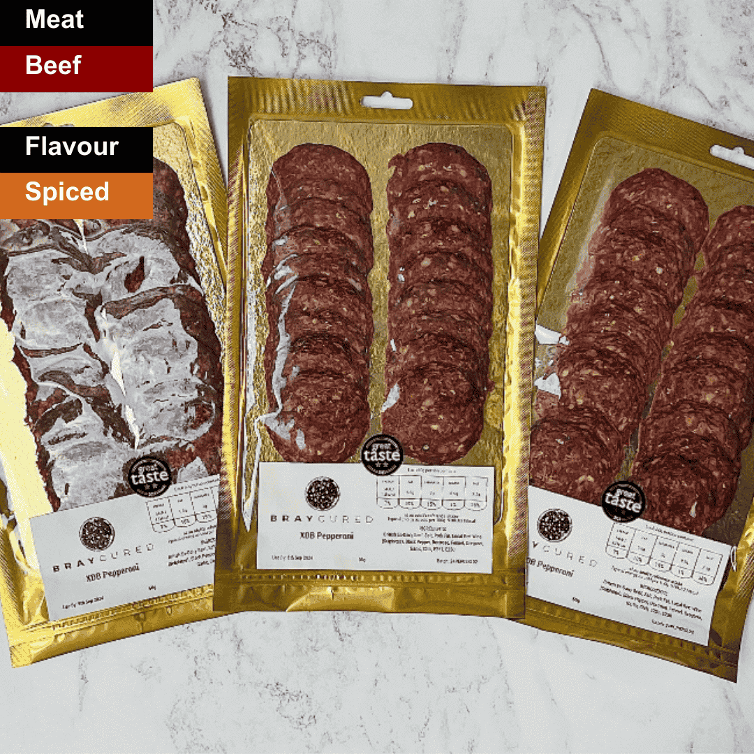 Sliced British Pepperoni from Bray Cured charcuterie, showcasing spicy, thinly sliced cured meat on a white background.