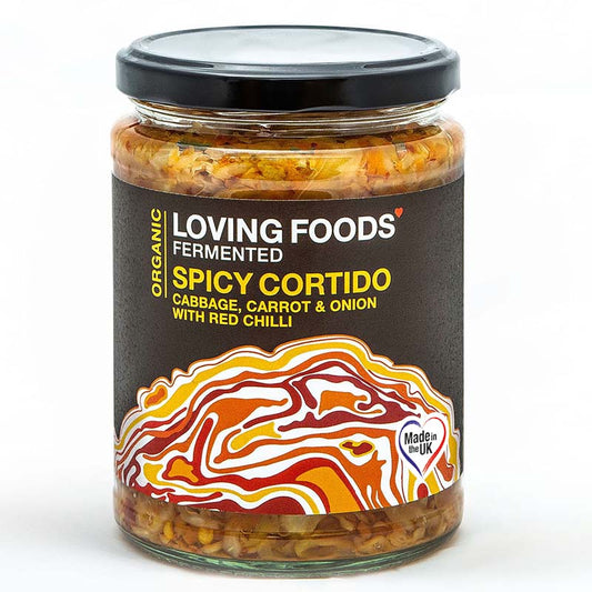 Organic spicy cortido sauerkraut in a jar from Loving Foods, showing vibrant fermented cabbage and chili flakes.