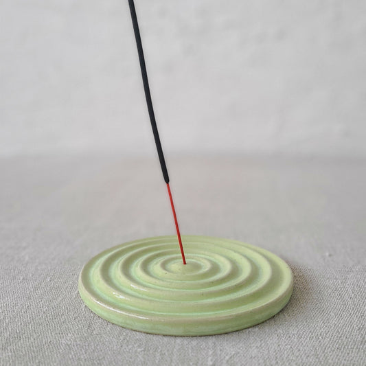 Spring green ceramic incense burner by Katie L Thompson Designs with a classic, elegant design for burning incense sticks.