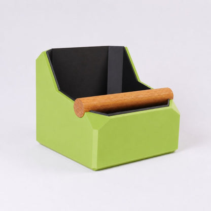 KNOCDIC® square coffee knock box in apple green with a real oak knock bar, used for espresso machine portafilter knocking.