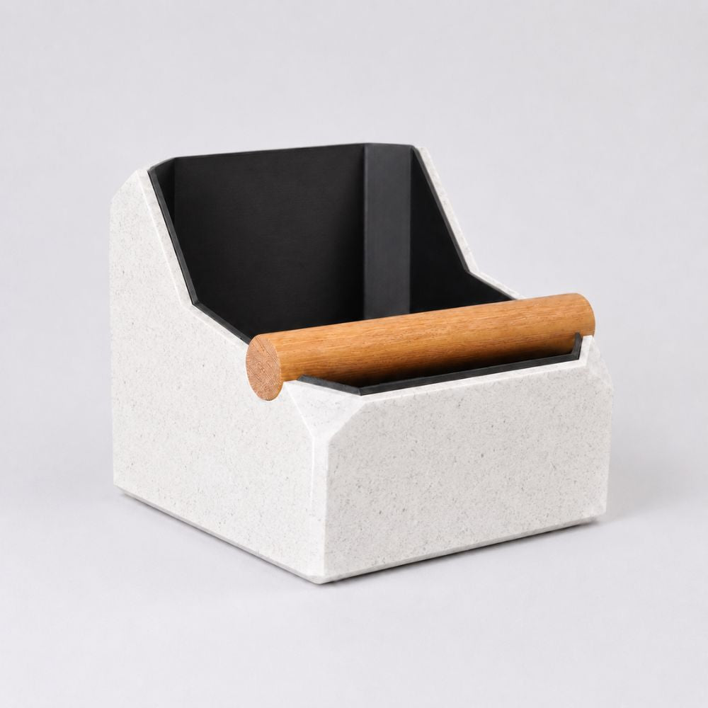Square coffee knock box by KNOCDIC® with white marble finish and a real oak knock bar for espresso pucks.