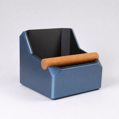 Square metallic blue KNOCDIC® coffee knock box with a real oak knock bar for barista espresso station.