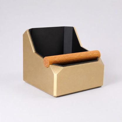 KNOCDIC® square coffee knock box in metallic gold with real oak knock bar for espresso shot cleanup.