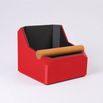 Red square coffee knock box with a real oak knock bar for espresso portafilter grounds cleaning, by KNOCDIC®.