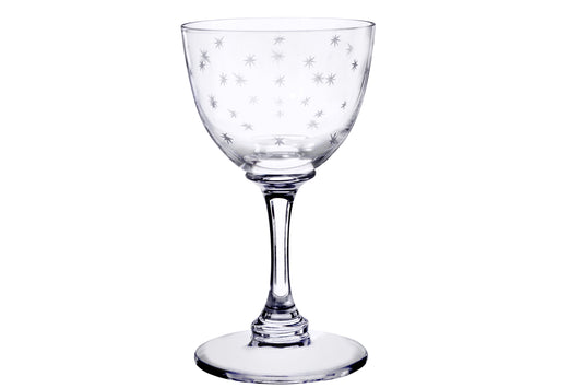 Crystal liqueur glasses with star design by The Vintage List, featuring elegant glassware for sipping spirits.