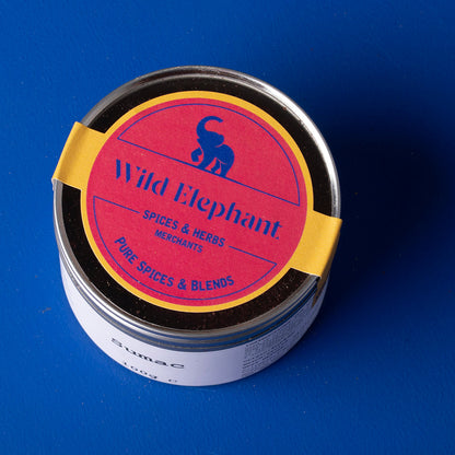 Whole Food Earth wild elephant sumac spice in 100g package showing vibrant red spice granules.